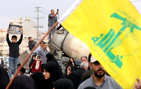 پیکر رئیس جمهور شهید در قم تشییع شد