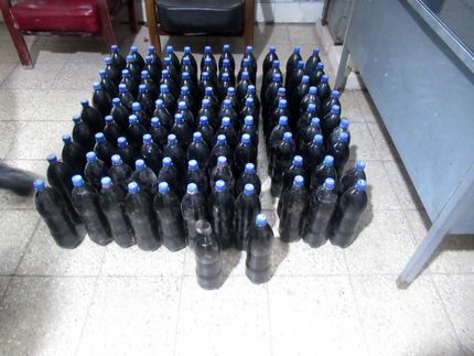 کشف محموله قاچاق ۲۰۱ کیلو تریاک با بطریهای آب معدنی