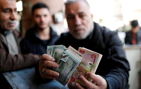 عراق معامله با دلار را ممنوع کرد