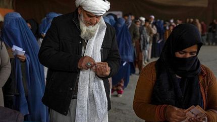 کمک نقدی برنامه جهانی غذا به نیازمندان افغان