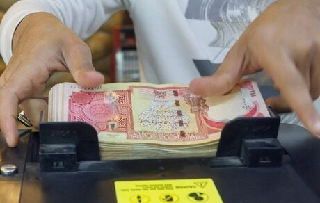 عراق استفاده از دینار را در معاملات جایگزین دلار می‌کند