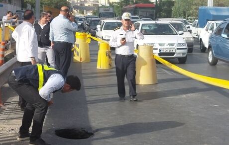 نشست یا حفره در بزرگراه امام علی تهران / ترافیک و راه بندان سنگین در محدوده