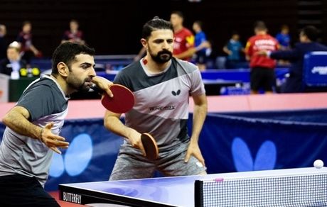 مدال برنز بر گردن برادران عالمیان