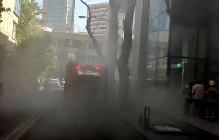 نجات ٨٠ نفر از آتش سوزی یک مجتمع اداری-تجاری