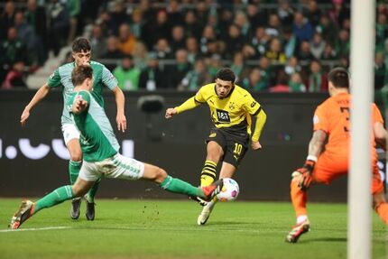 دورتموند ۱۰ نفره برد و مدعی ماند
